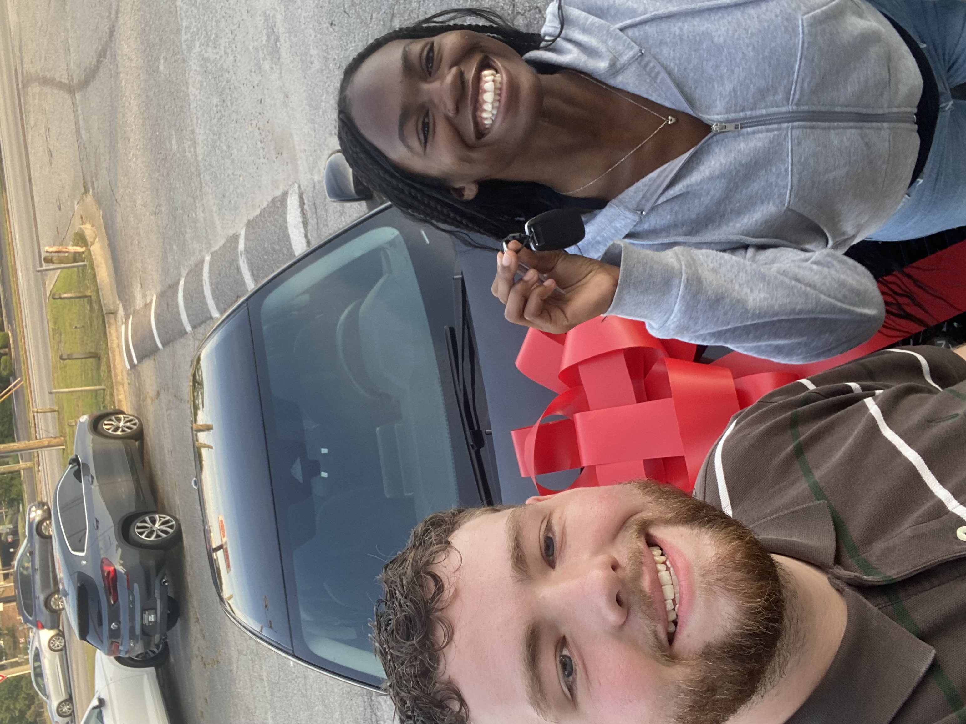 Happy customer with their new car